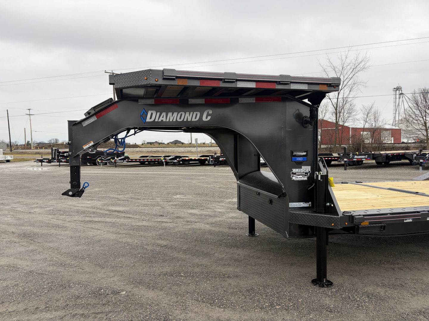 New 2026 Diamond C Trailers HXD210L24X102-GN (24' x 102") 23K Partial Tilt Equipment Trailer