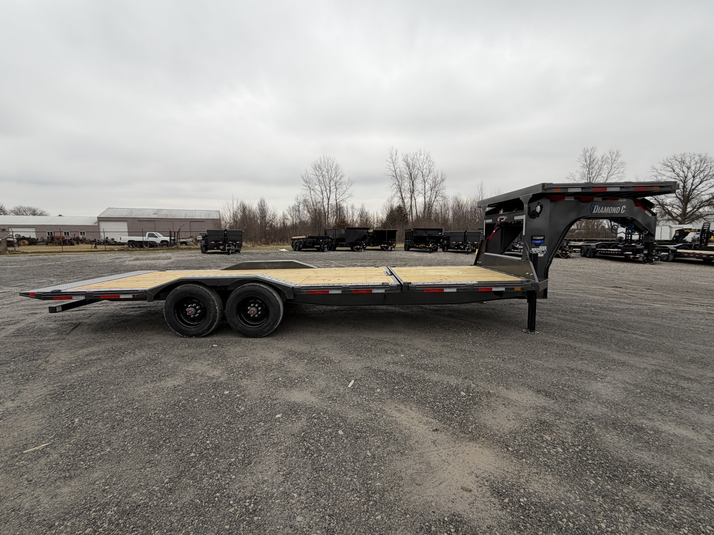 New 2026 Diamond C Trailers HXD210L24X102-GN (24' x 102") 23K Partial Tilt Equipment Trailer