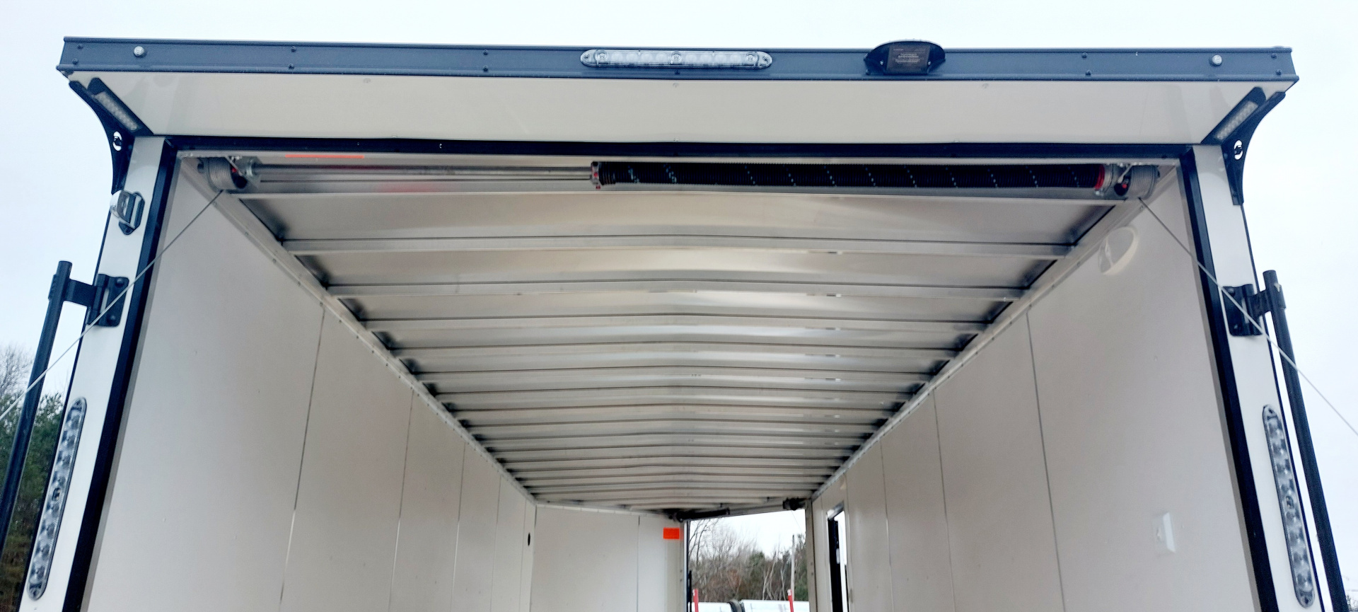 New 8 X 22 SNOWMOBILE/CAR HAULER ENCLOSED ALL ALUMINUM W/ FRONT DROP DOWN RAMP 2026 LIGHTNING