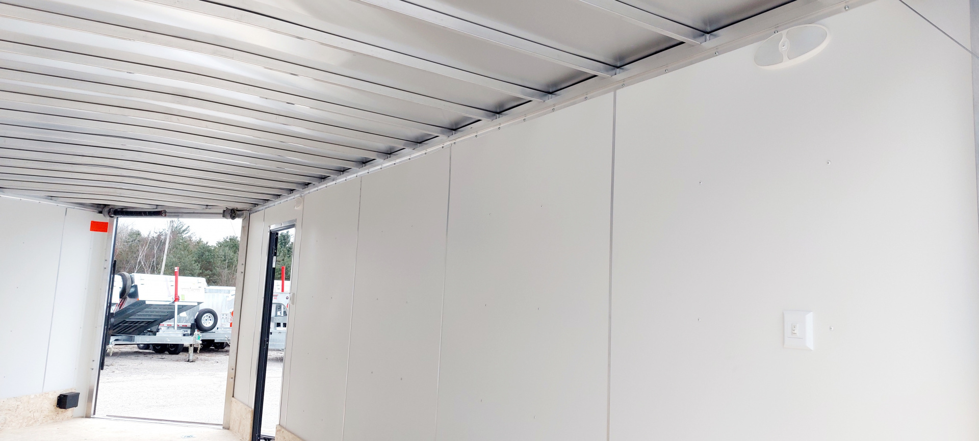 New 8 X 22 SNOWMOBILE/CAR HAULER ENCLOSED ALL ALUMINUM W/ FRONT DROP DOWN RAMP 2026 LIGHTNING