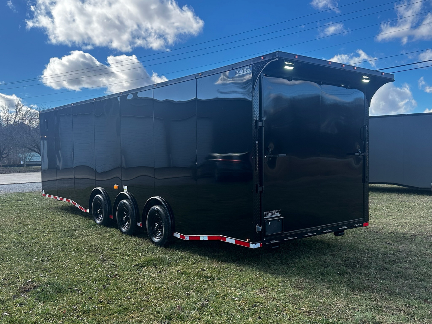 New 2026 Luxe 8.5x28 Car Hauler - 5200LB Triple Torsion Axle - Black Poly- Blackout - Enclosed Car Hauler