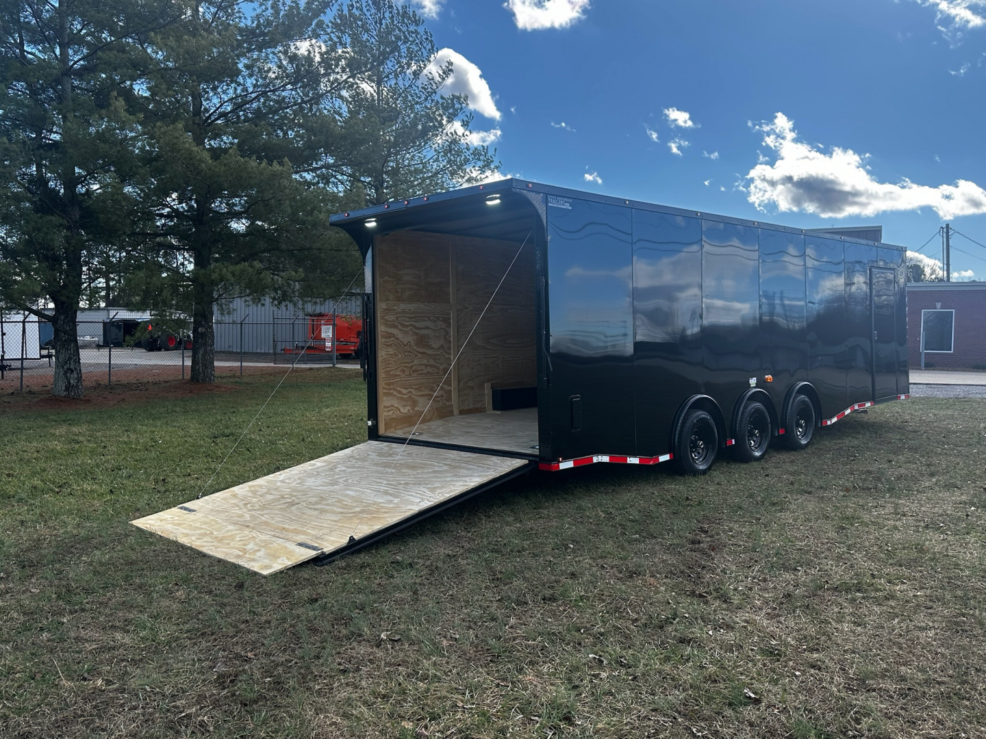New 2026 Luxe 8.5x28 Car Hauler - 5200LB Triple Torsion Axle - Black Poly- Blackout - Enclosed Car Hauler