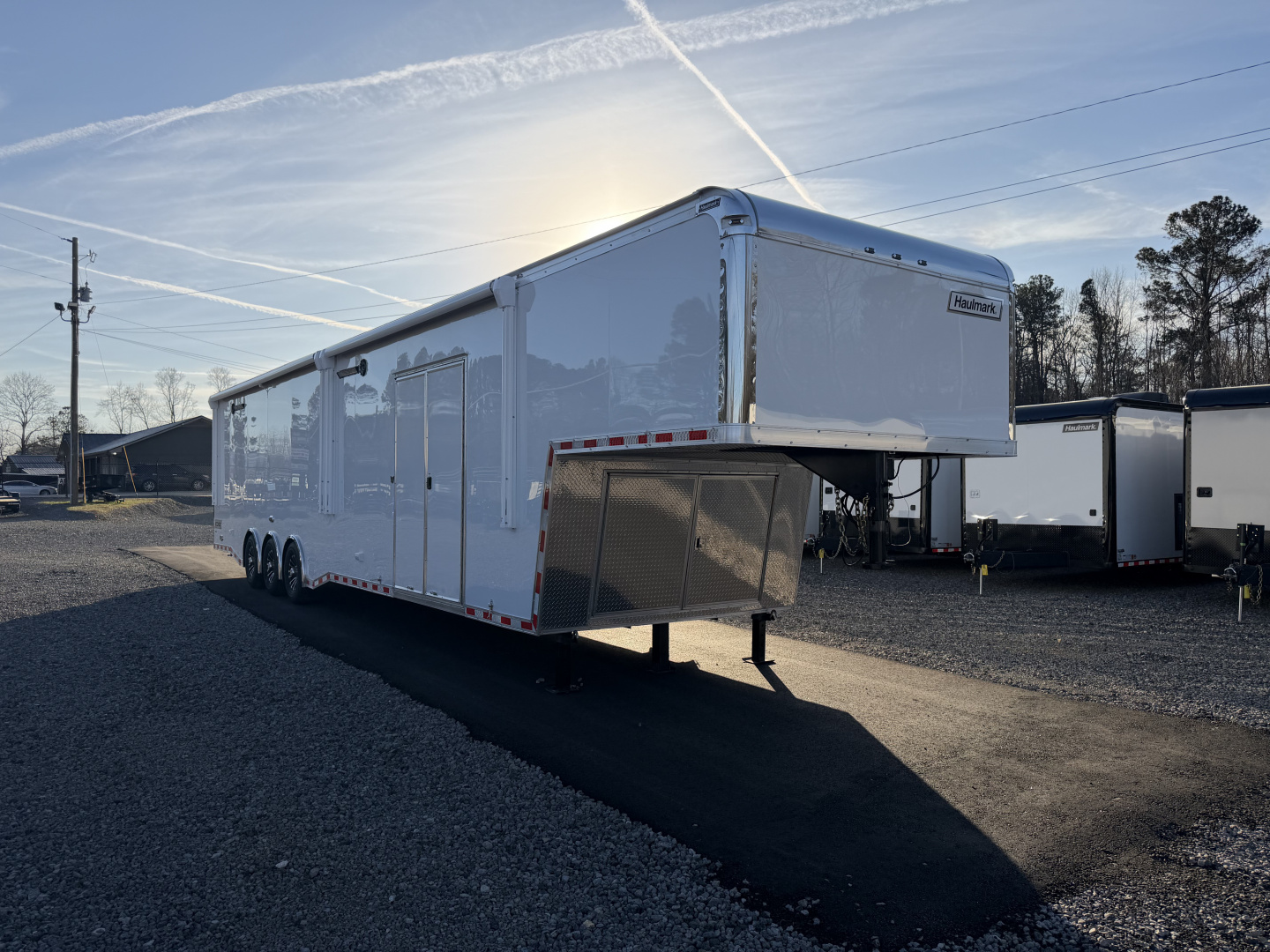 New 2026 Haulmark 44 Gooseneck Bathroom, Black PolyCor, 21K GVWR, Air Prep, Awning, A/C, Landing Light PKG, Hyd. Tongue Jack