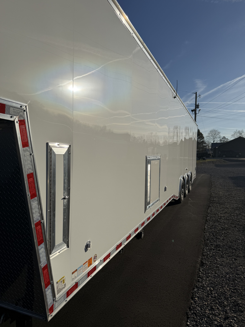 New 2026 Haulmark 44 Gooseneck Bathroom, Black PolyCor, 21K GVWR, Air Prep, Awning, A/C, Landing Light PKG, Hyd. Tongue Jack