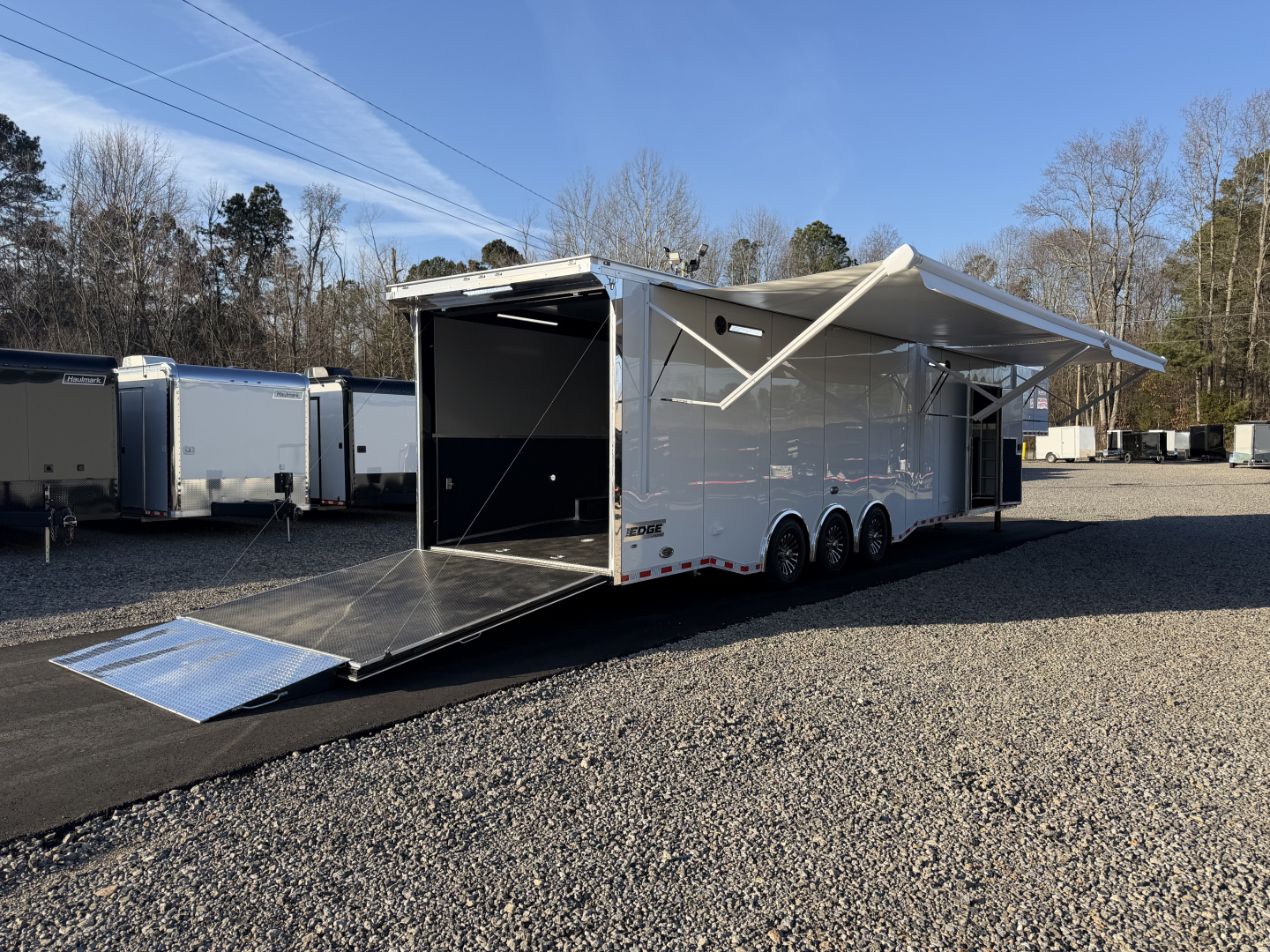 New 2026 Haulmark 44 Gooseneck Bathroom, Black PolyCor, 21K GVWR, Air Prep, Awning, A/C, Landing Light PKG, Hyd. Tongue Jack