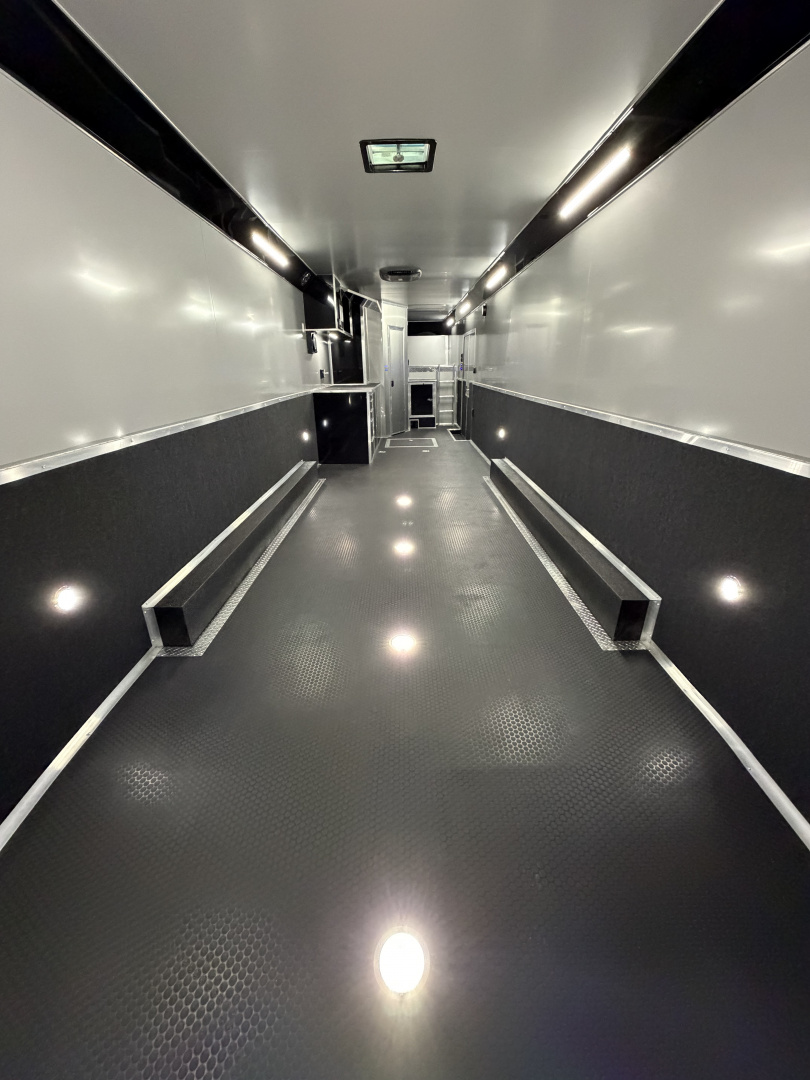 New 2026 Haulmark 44 Gooseneck Bathroom, Black PolyCor, 21K GVWR, Air Prep, Awning, A/C, Landing Light PKG, Hyd. Tongue Jack